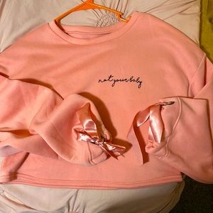 NWOT “Not your baby “ crop top.